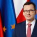  Inicialmente, Mateusz Morawiecki, su predecesor del partido populista de derecha Ley y Justicia (PiS), había sido reelegido por el presidente Andrzej Duda, en deuda con el PiS, con el pretexto de formar un gobierno. Como era de esperar, no logró ganar un voto de confianza en el parlamento. Foto: Kancelaria Premiera. Wikimedia.